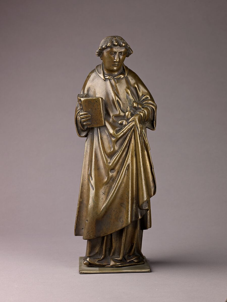 Saint Stephen, Brass (copper alloy with a high percentage of
zinc) with natural olive green patina., Netherlandish, Tournai