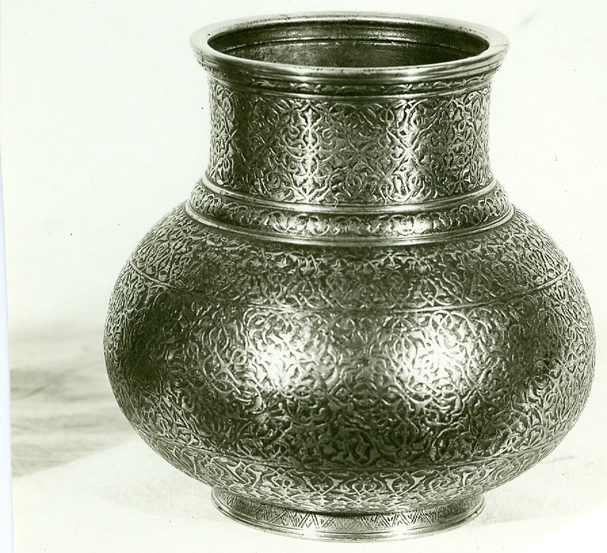 Vase with Arabesque Design, Brass, inlaid with traces of silver., Syrian (Damascus), Persian, or Egyptian (Cairo)