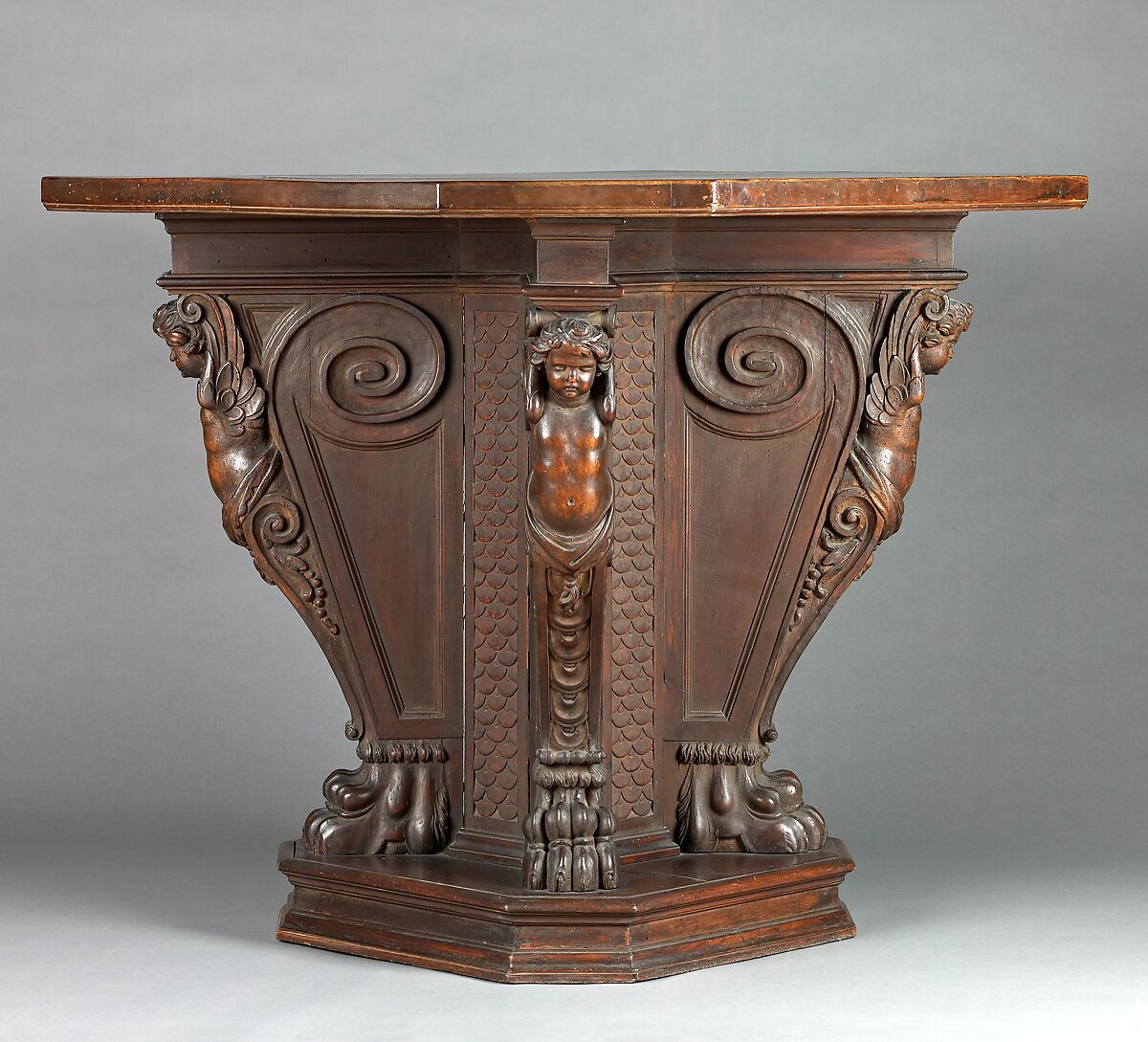 Octagonal table, Walnut, carved., Italian (?) or American (United States?)