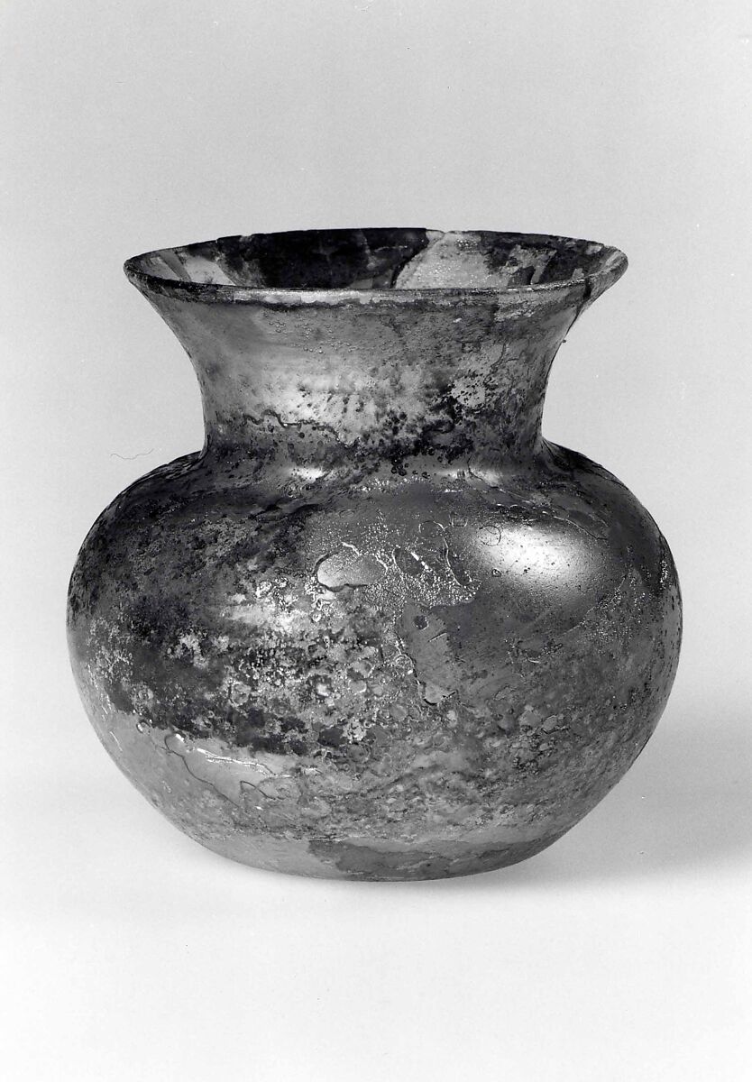 Jar, Almost colorless glass with a yellowish green tint. Blown, the rim finished at the furnace., Roman 