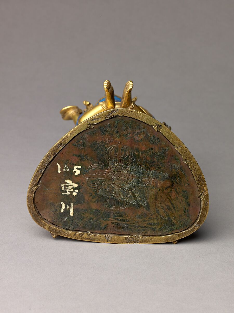 Buddhist deity Vajradhara in union with his consort Prajnaparamita, Gilt brass with copper base and applied color., probably Chinese or Tibetan