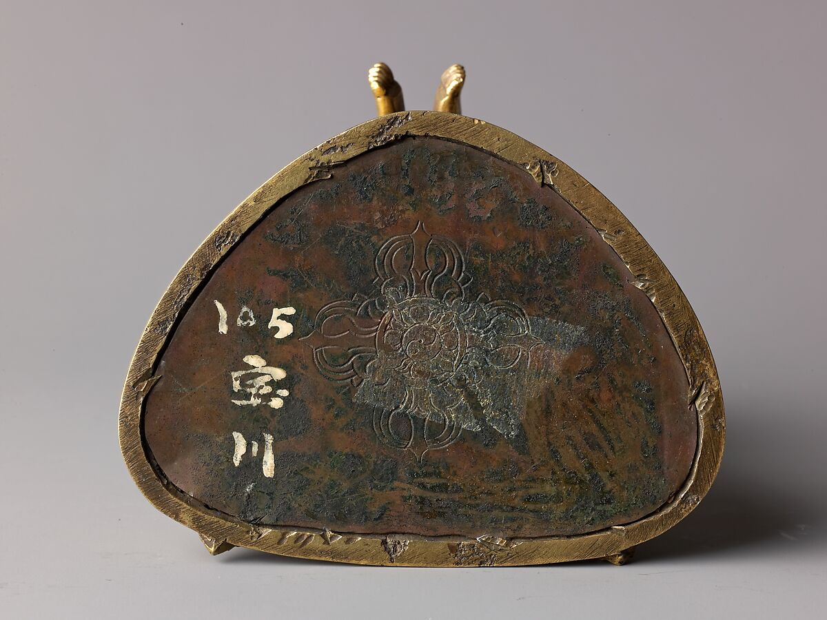 Buddhist deity Vajradhara in union with his consort Prajnaparamita, Gilt brass with copper base and applied color., probably Chinese or Tibetan