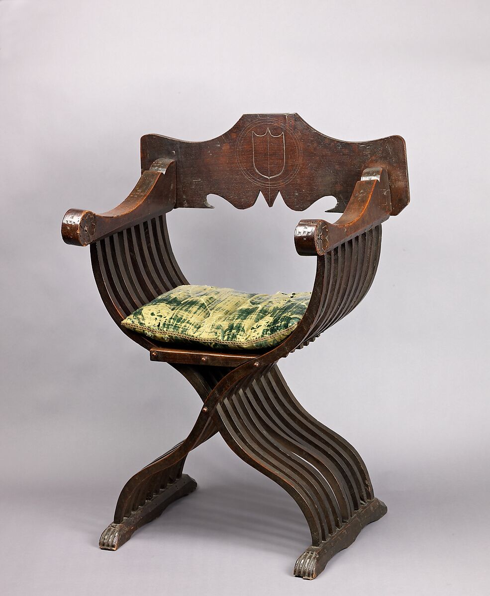 Folding armchair (sedia a Savonarola type), Walnut, partly turned and carved; green velvet., Italian 