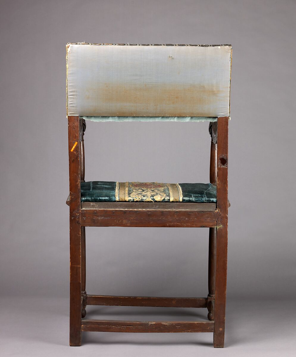 Armchair (chaise à bras, pair with 1975.1.2000), Walnut, turned and carved; dark blue silk cut velvet with embroidery., French, Italian or Spanish