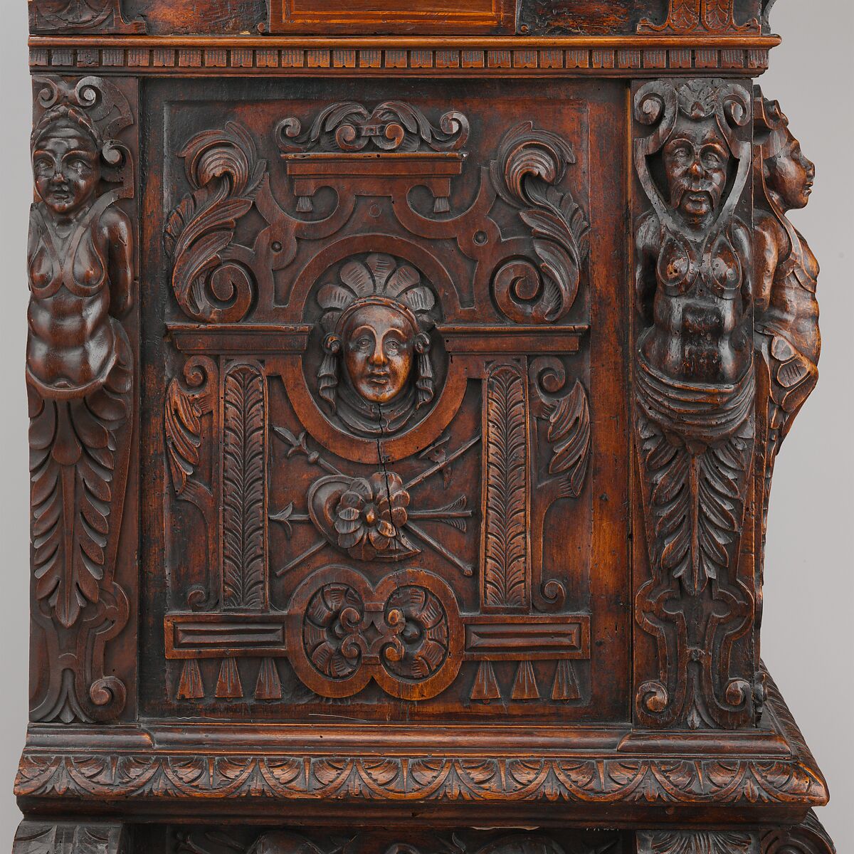 Dresser (Dressoir aux harpies), Carved walnut with interior elements of oak, pine; iron locks and hinges., French (Ile-de-France or Burgundo-Lyonnais)