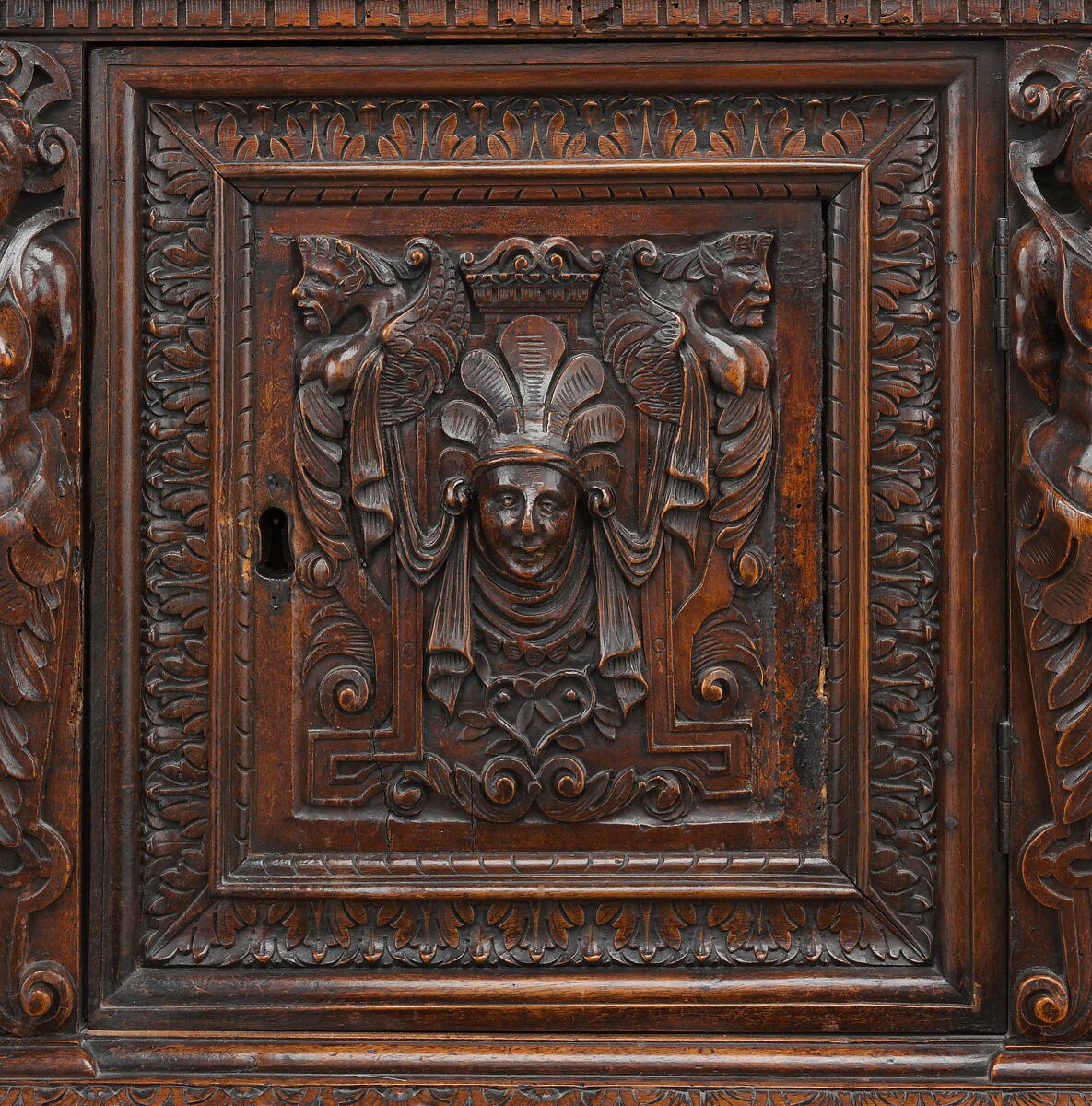 Dresser (Dressoir aux harpies), Carved walnut with interior elements of oak, pine; iron locks and hinges., French (Ile-de-France or Burgundo-Lyonnais)