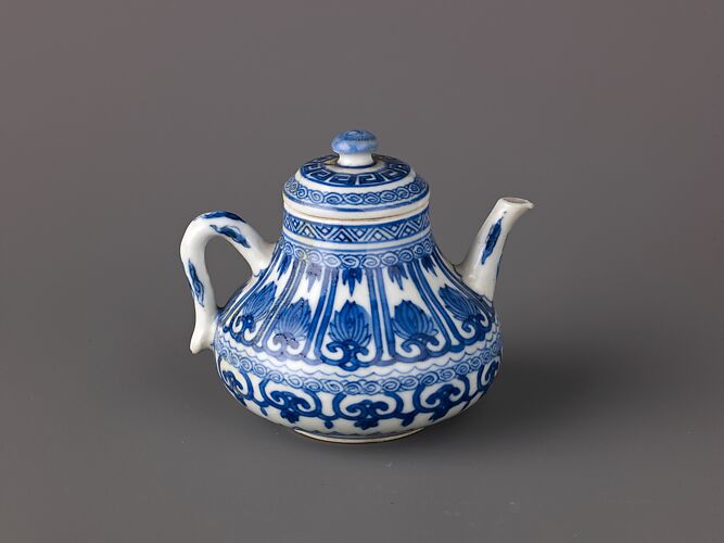 Small covered wine pot or teapot
