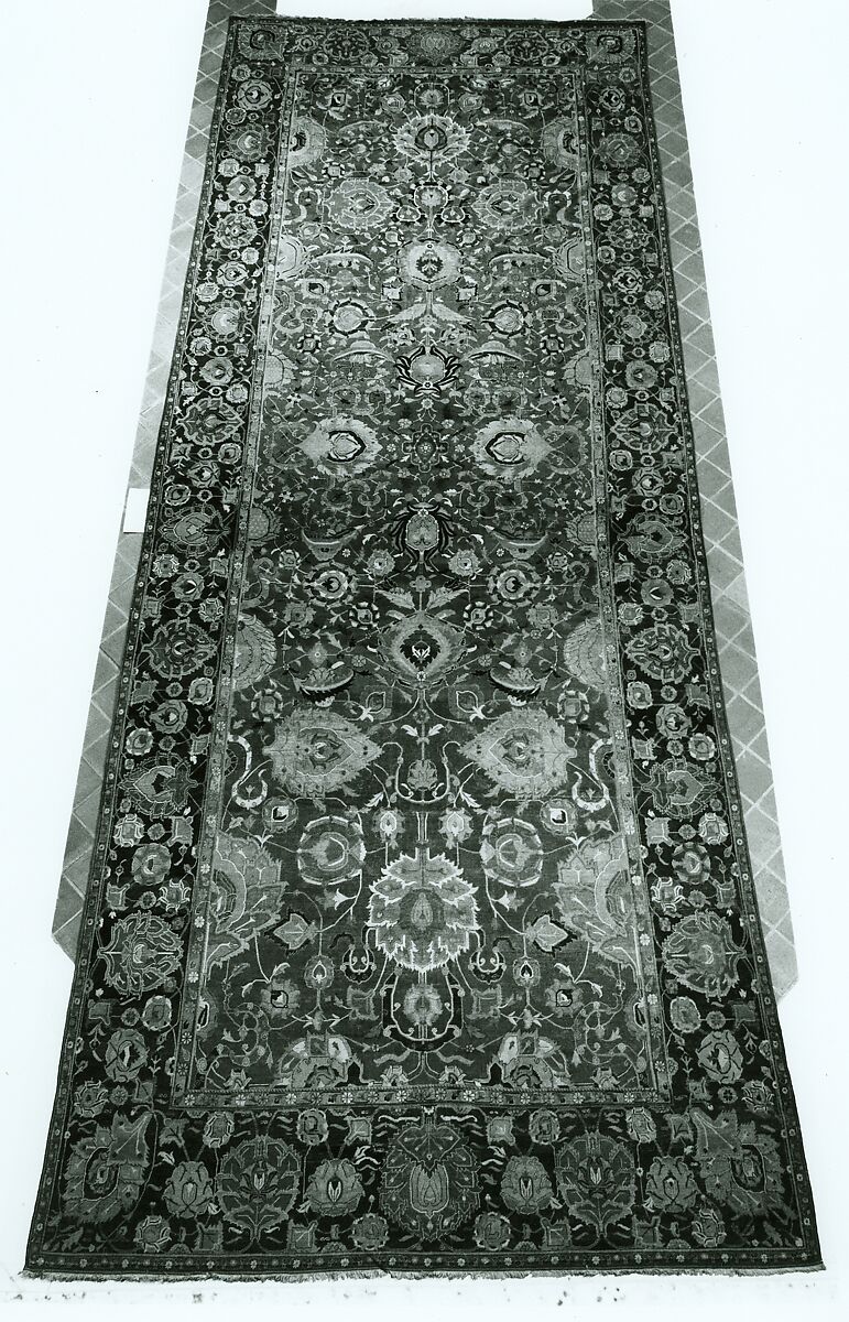 Indo-Persian carpet with vine scroll and palmette pattern, Wool pile on cotton foundation., Indo-Persian