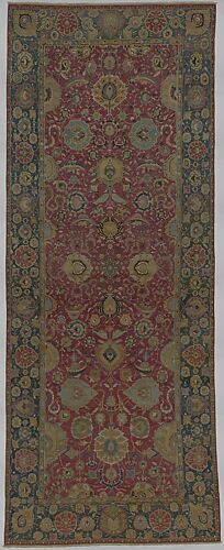 Indo-Persian carpet with vine scroll and palmette pattern
