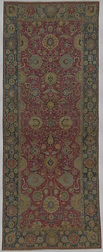 Indo-Persian carpet with vine scroll and palmette pattern