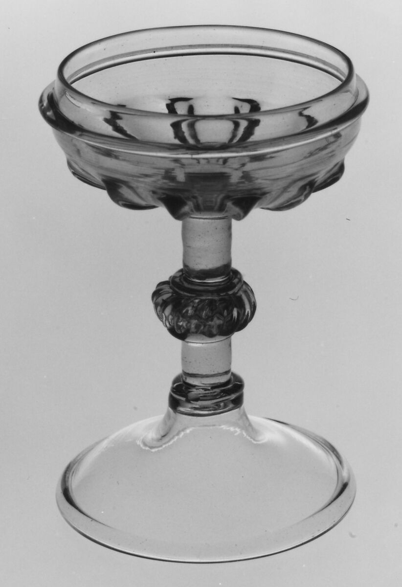 Stemmed cup (?), Colorless (slightly grayish tan) nonlead glass. Blown, pattern molded, trailed, gilt., Italian (Venice) or façon de Venise