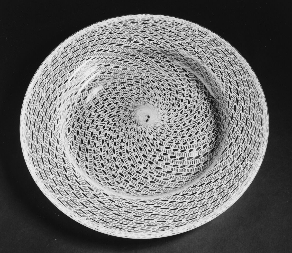 Plate, Colorless (slightly gray) and opaque white nonlead glass. Blown, "vetro a retorti"., Italian (Venice)