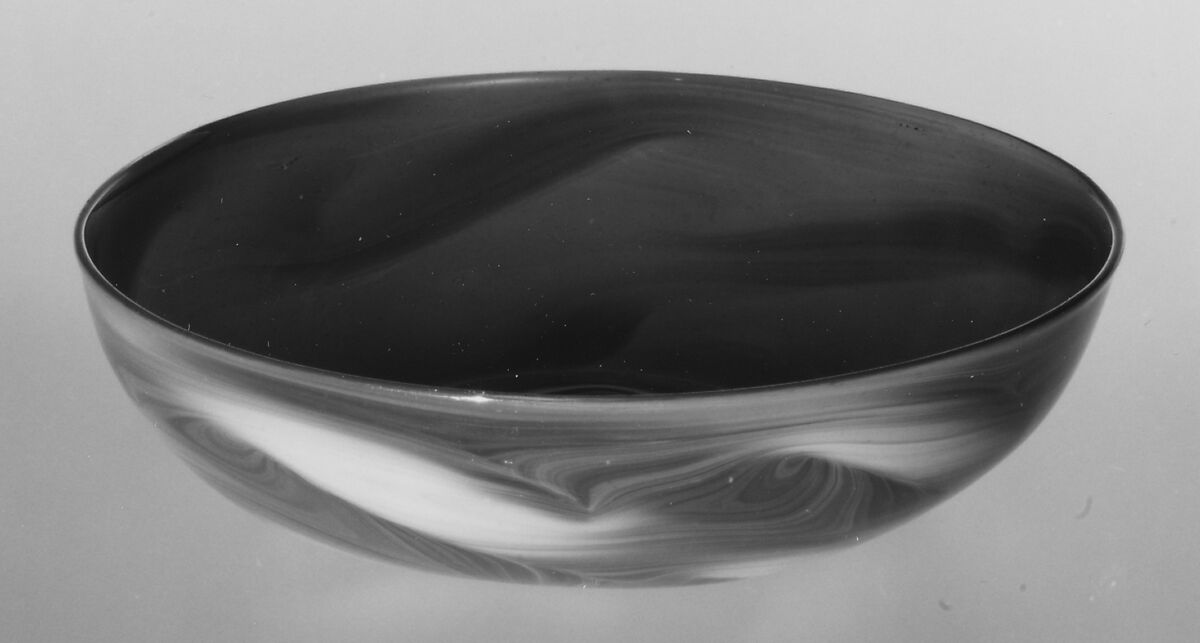 Bowl, Translucent amber nonlead glass with multicolored marbling on the exterior. Blown, Italian (probably Venice)