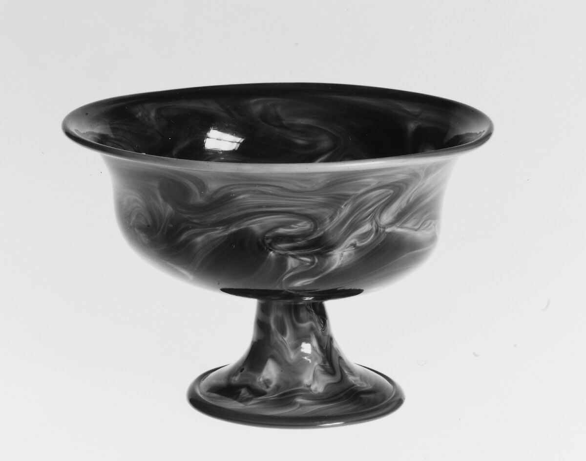 Footed bowl, Translucent red nonlead glass with multicolored marbling on the exterior. Blown., Italian (Venice)