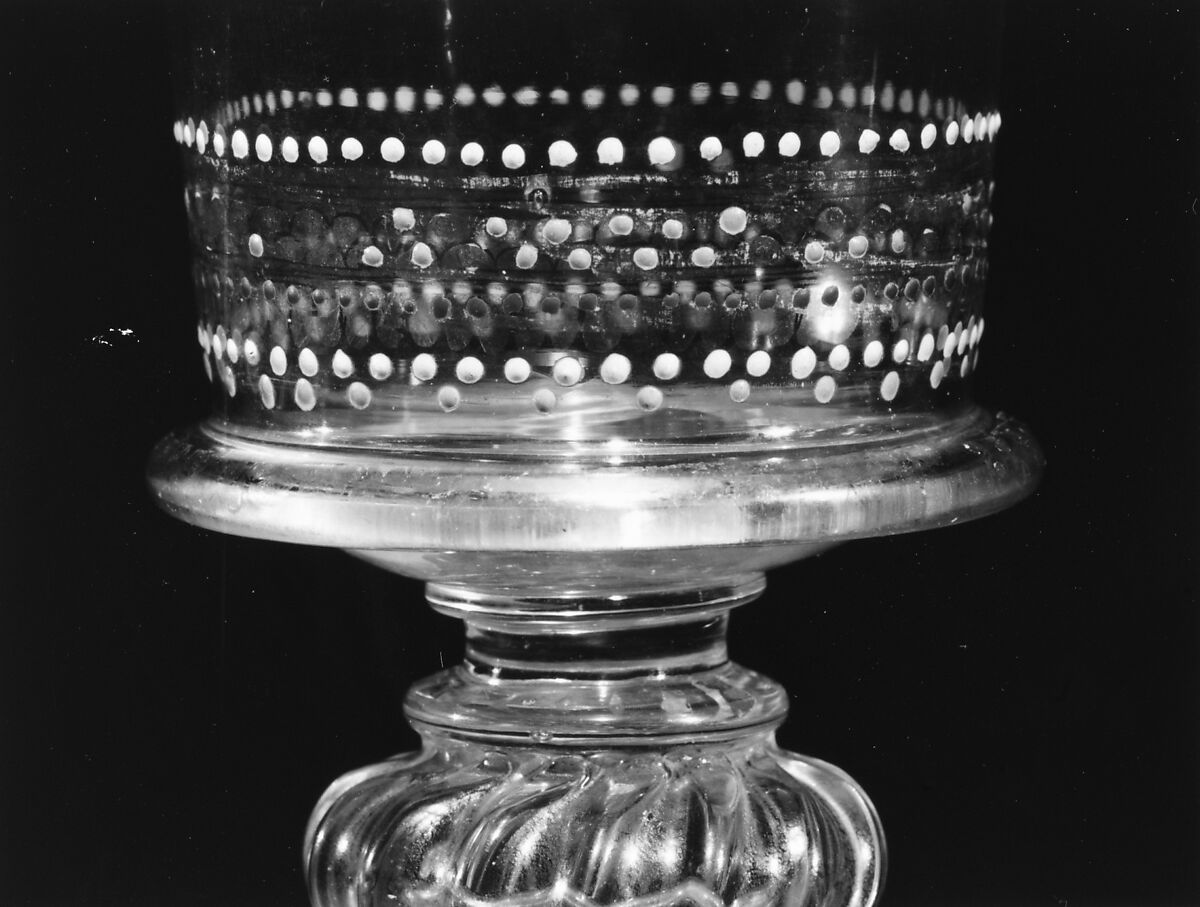 Goblet, Colorless (slightly grayish tan) nonlead glass. Blown, pattern molded, enameled, gilt., Italian (Venice)