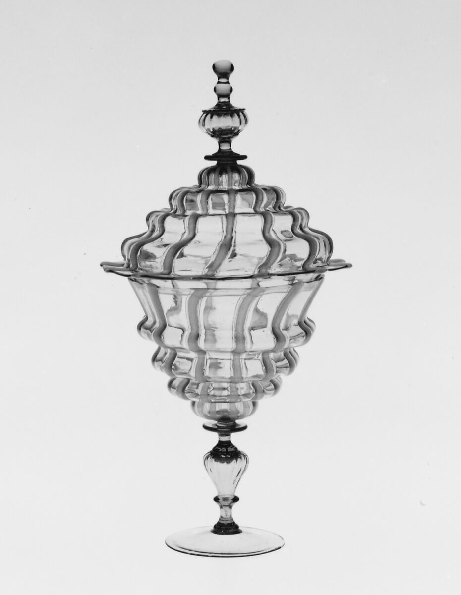 Covered sweetmeat dish, probably Antonio Salviati (Italian, 1816–1890), Topaz-tinted and opaque brownish white nonlead glass. Blown, pattern molded, "vetro a fili". 