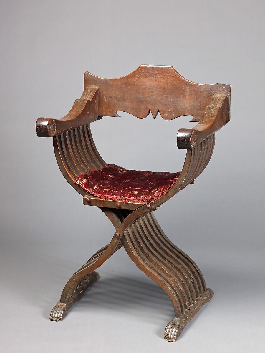 Folding armchair (sedia a Savonarola type), Walnut, partly turned and carved; red plain velvet., Italian 