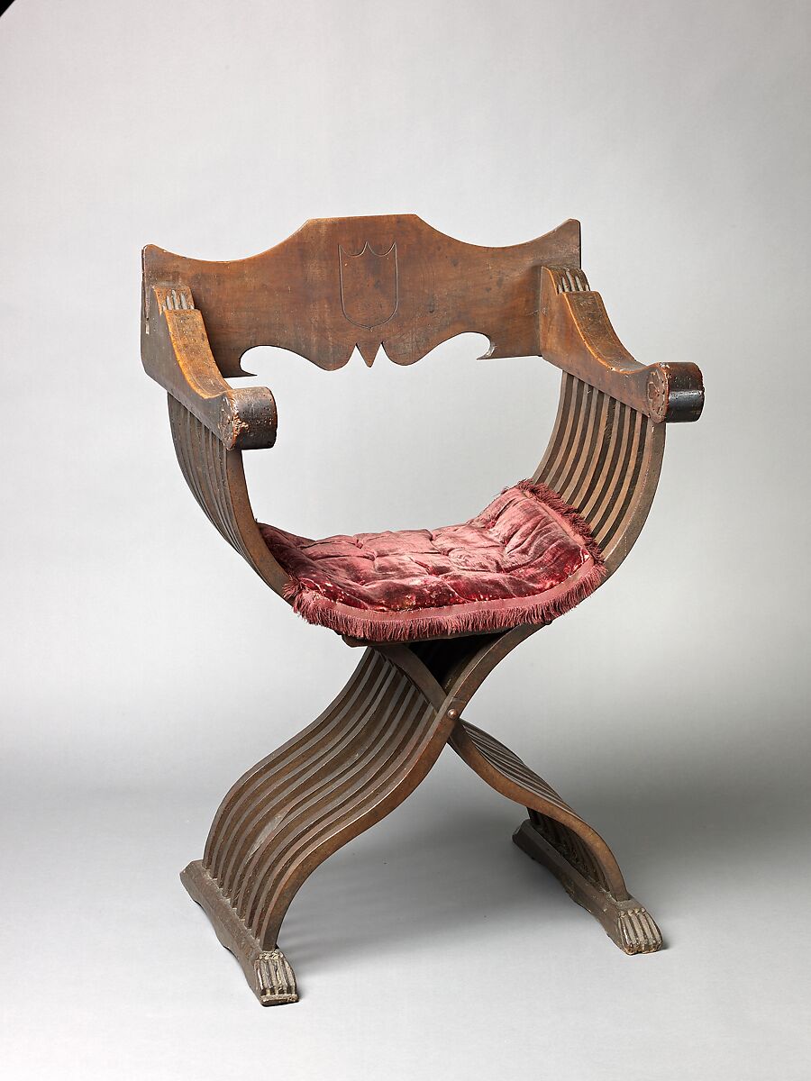 Folding armchair (sedia a Savonarola type), Walnut, partly turned and carved; red plain velvet., Italian 