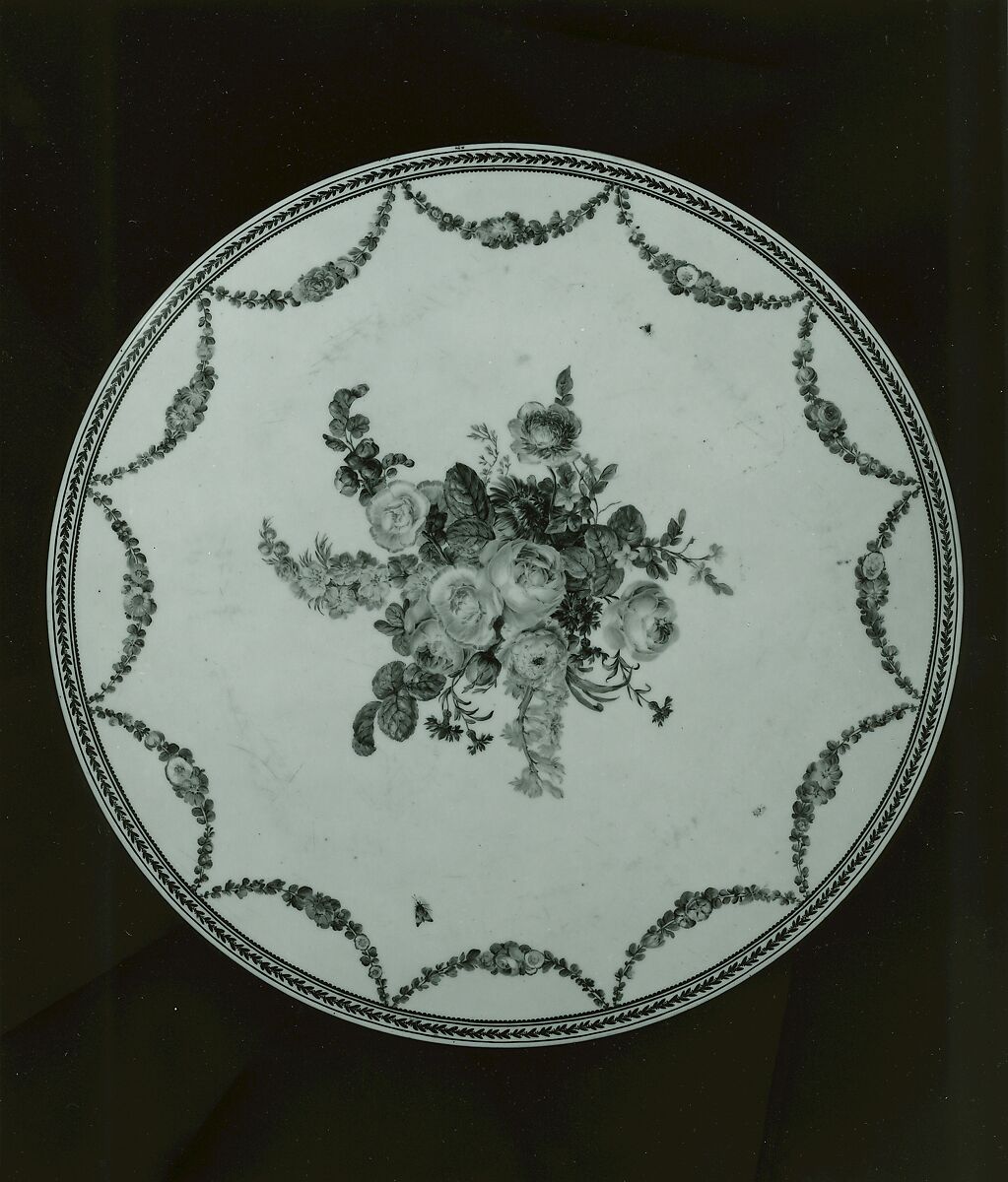 Louis XVI round table with sevres top, Oak veneered with tulipwood, rosewood, green-stained maple, holly stringing; legs veneered with rosewood and partly shaded satinwood; gilt-bronze mounts., French, Paris