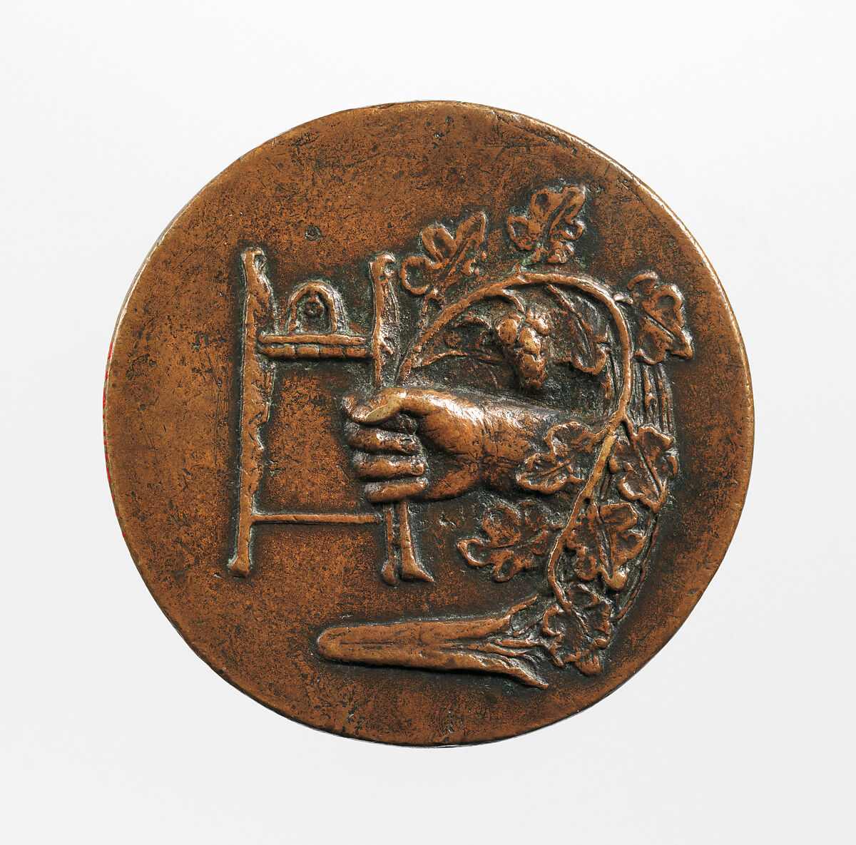 Portrait medal of Battista Vigo da Rapallo or Baptista Romanus (obverse); a Hand Holding a Branch and a Surgical Instrument, Bronze (copper alloy with light brown
patina and remnants of black wax or lacquer)., Italian, Venice or Padua (?)