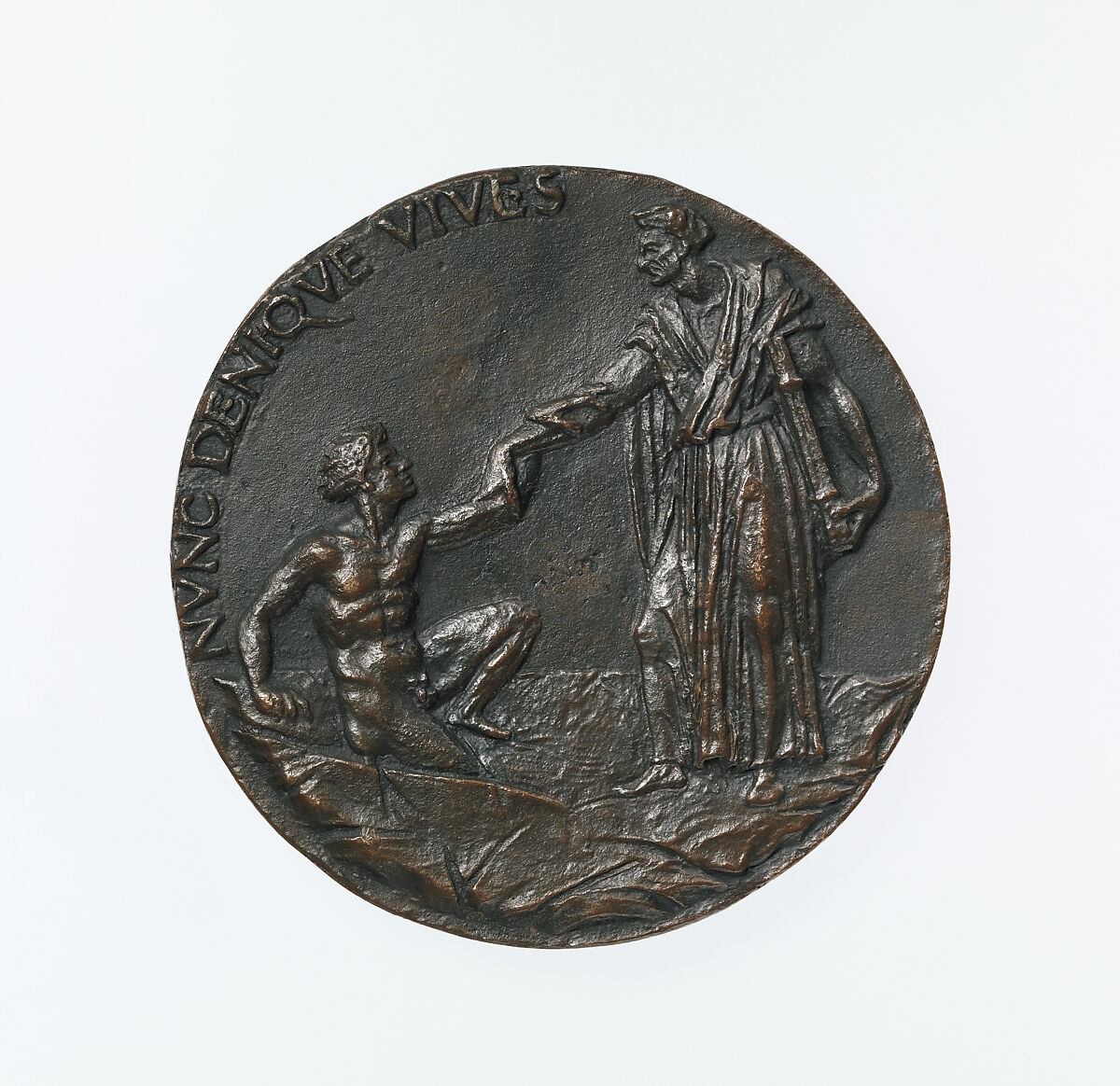 Portrait medal of Paolo Giovio (obverse); Giovio Raising a Man from a Grave (reverse), Francesco da Sangallo (Italian, 1494–1576), Bronze (Copper alloy with brown patina
under a layer of dark wax.)
