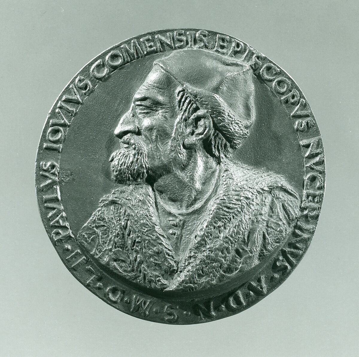 Portrait medal of Paolo Giovio (obverse); Giovio Raising a Man from a Grave (reverse), Francesco da Sangallo (Italian, 1494–1576), Bronze (Copper alloy with brown patina
under a layer of dark wax.)