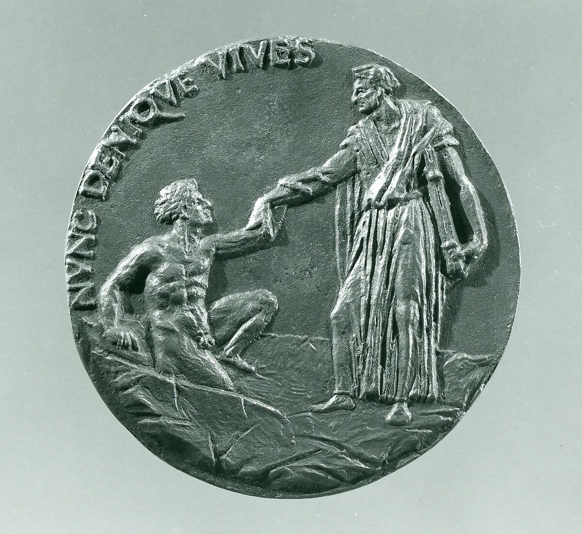 Portrait medal of Paolo Giovio (obverse); Giovio Raising a Man from a Grave (reverse), Francesco da Sangallo (Italian, 1494–1576), Bronze (Copper alloy with brown patina
under a layer of dark wax.)