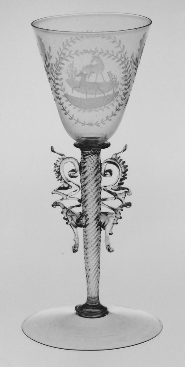 Wineglass, Colorless (slightly tan) nonlead glass. Blown, pattern molded, trailed, pincered, wheel-engraved., probably Italian (Venice)