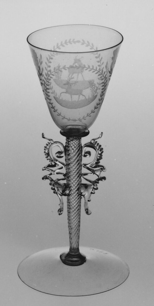 Wineglass, Colorless (slightly tan) nonlead glass. Blown, pattern molded, trailed, pincered, wheel-engraved., probably Italian (Venice)