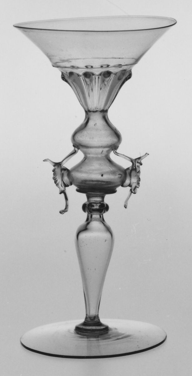 Wineglass, Colorless (slightly tan) nonlead glass. Blown, pattern molded, trailed, pincered, wheel-engraved., probably Italian (Venice)