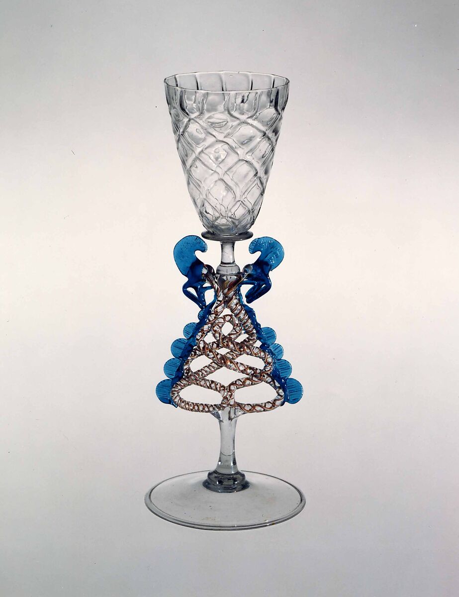 Goblet, Colorless (slightly gray) transparent turquoise blue, and opaque brick red, white, and yellow nonlead glass. Blown, pattern molded, trailed, pincered, "vetro a retorti"., Façon de Venise, probably south Lowlands or Germany