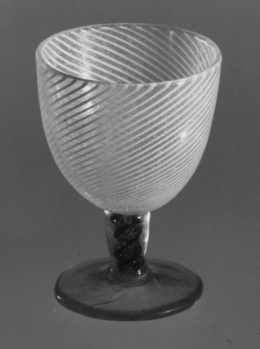 Liqueur glass, Colorless (slightly gray), opaque white, copper-flecked (goldstone or aventurine), and transparent blue nonlead glass. Blown, "vetro a retorti"., Italian (Venice)