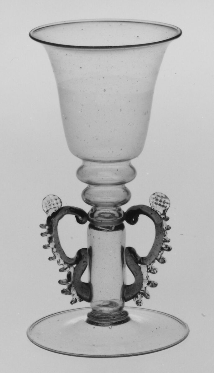 Wineglass, Colorless (slightly tan) and transparent bright blue-green bubbly nonlead glass. Blown, trailed, pincered., Façon de Venise, northern European