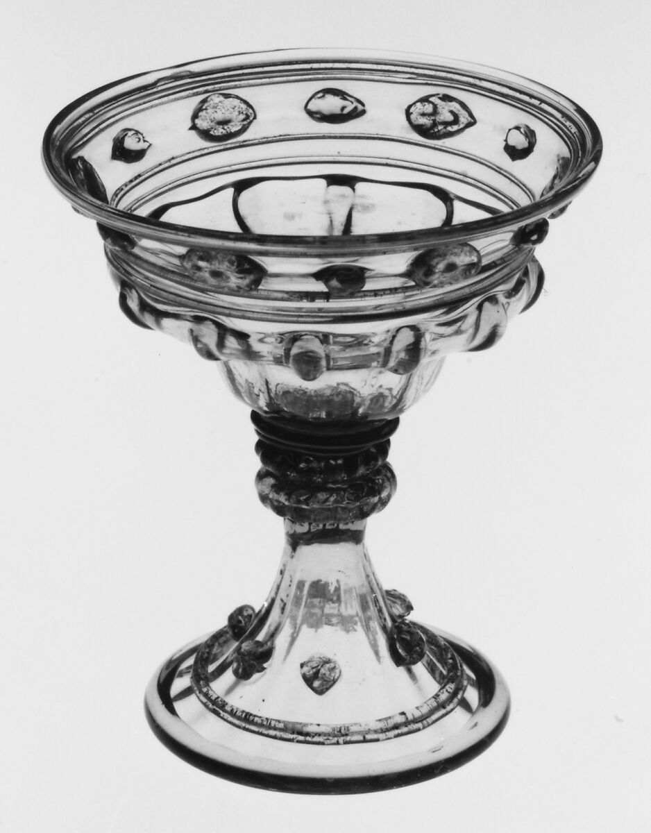 Footed vessel (saltcellar?), probably Antonio Salviati (Italian, 1816–1890), Topaz-tinted nonlead glass. Blown, pattern molded, applied and impressed parts, gilt. 