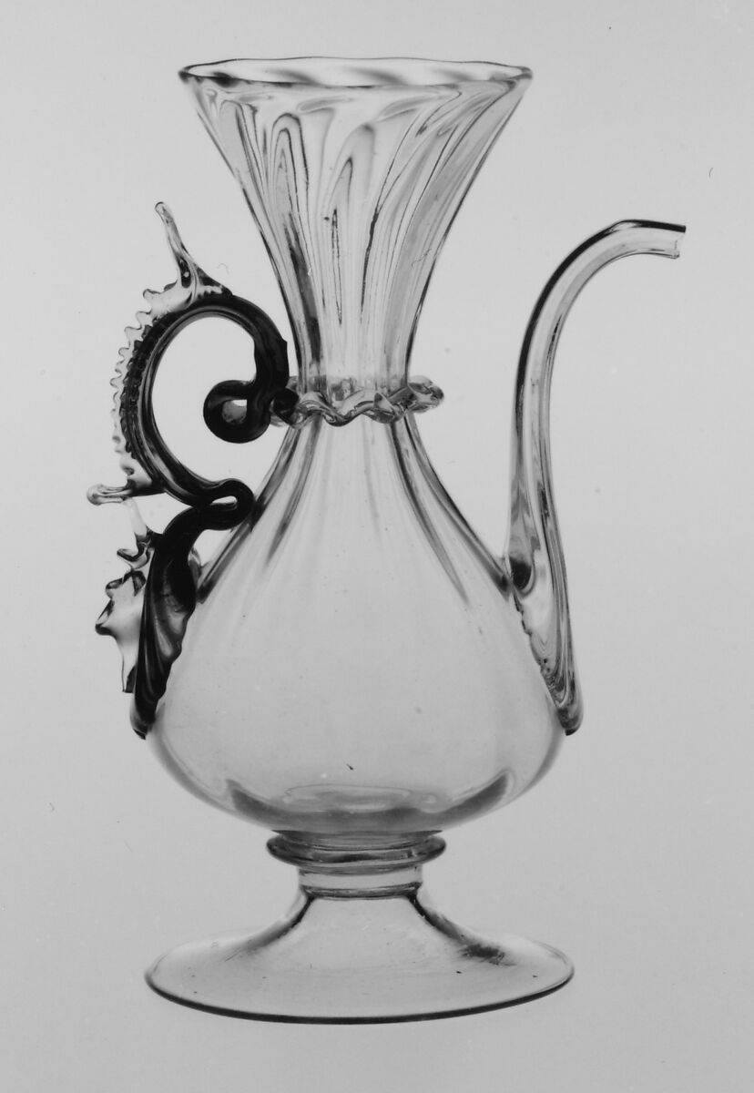 Cruet, Colorless (slightly grayish tan) and transparent turquoise blue nonlead glass. Blown, pattern molded, trailed, pincered., Italian (Venice)