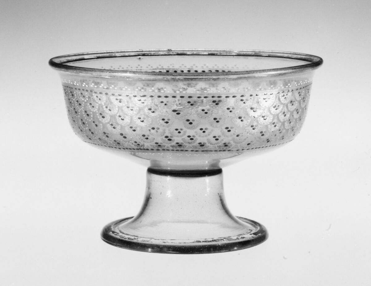 Footed bowl, Colorless (strong grayish tan), bubbly nonlead glass. Blown, enameled, gilt., Italian (Venice) 