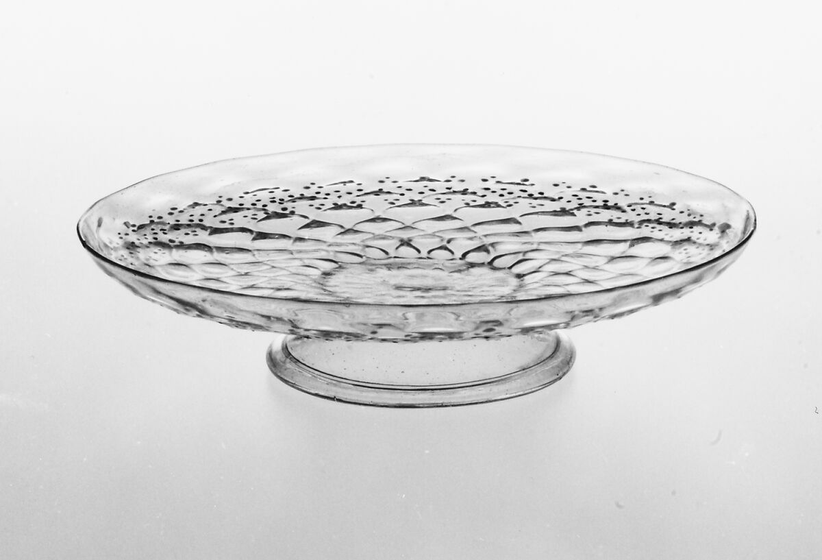 Tazza, Colorless (slightly tan) nonlead glass. Blown, pattern molded, enameled, gilt., Italian (Venice)