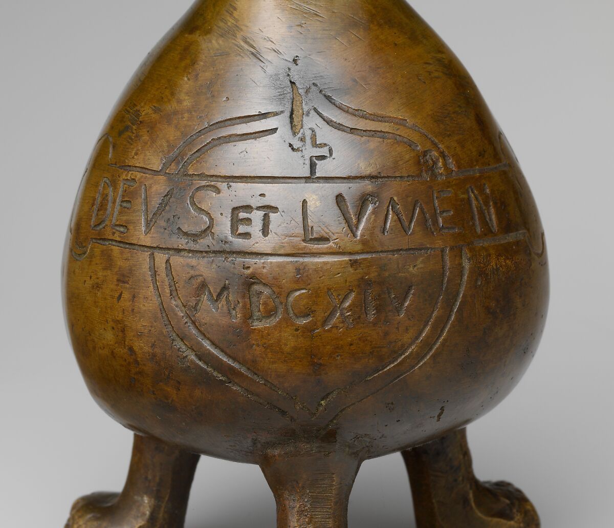 Aquamanile in the Form of a Gourd with a
Human Head, Bronze; quaternary copper alloy (62.8% copper, 18.3% lead; 11.9% zinc, 7% tin); with a thin layer of dark patina., German