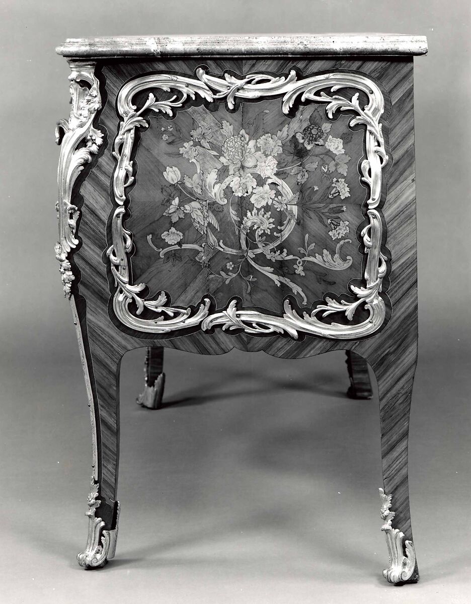 Commode, Attributed to Léonard Boudin (French, 1735–1807, master 1761)  , and, Oak and pine veneered with stained maple, tulipwood, amaranth, and holly stringing, with marquetry of stained, shaded, and engraved maple, mahogany, amaranth, barberry and other marquetry woods; gilt-bronze mounts; marble top; brass rollers.