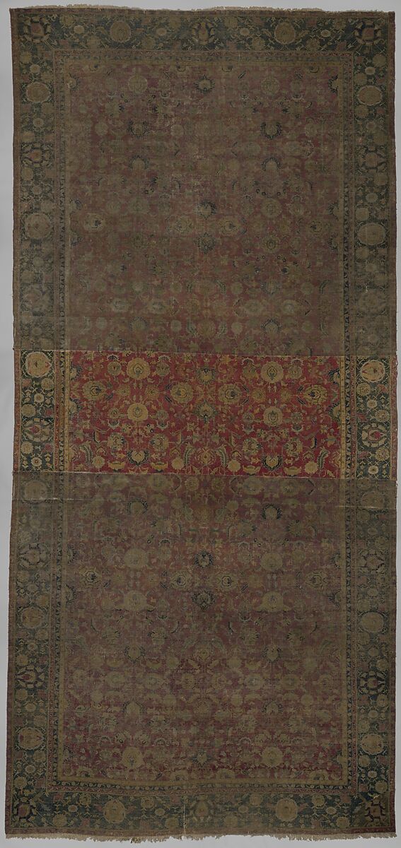 Indo-Persian carpet with repeat pattern of vine scrolls and palmettes., Wool pile on cotton foundation., Indo-Persian 