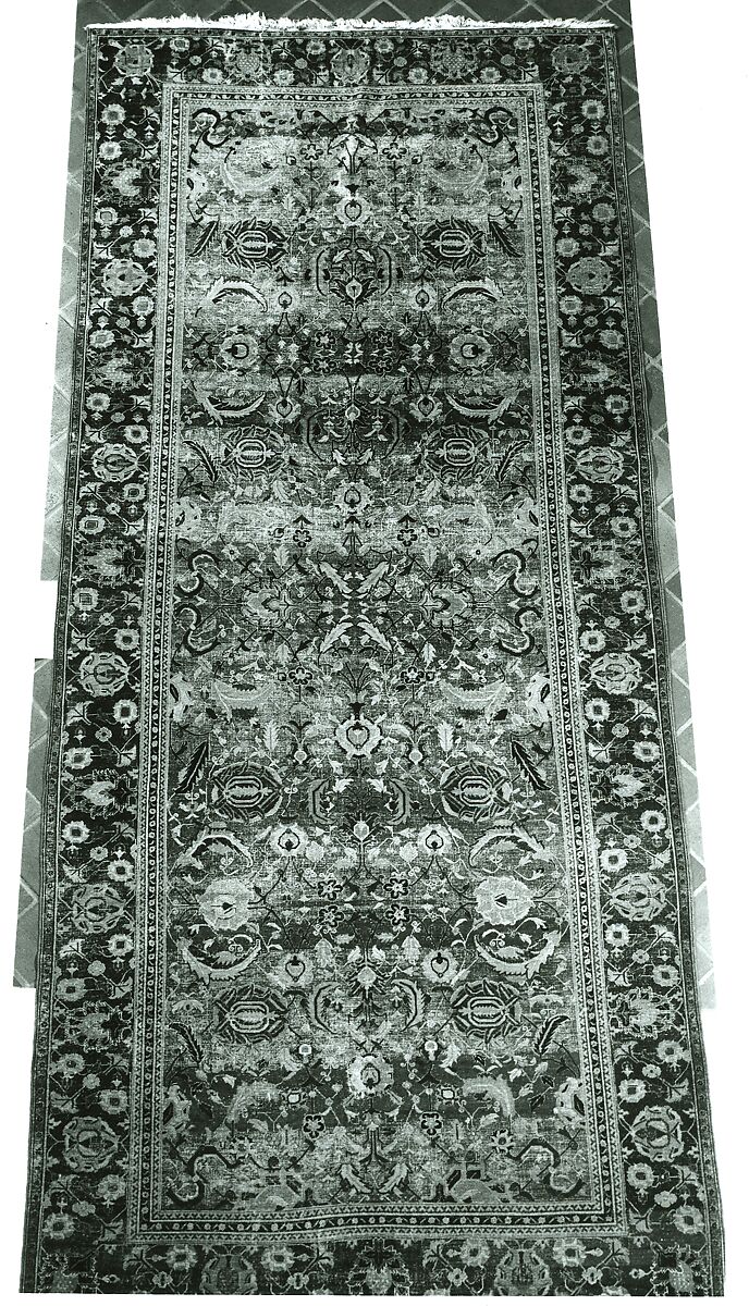 Indo-Persian carpet with vine scroll and palmette pattern, Wool pile on cotton foundation., Indo-Persian