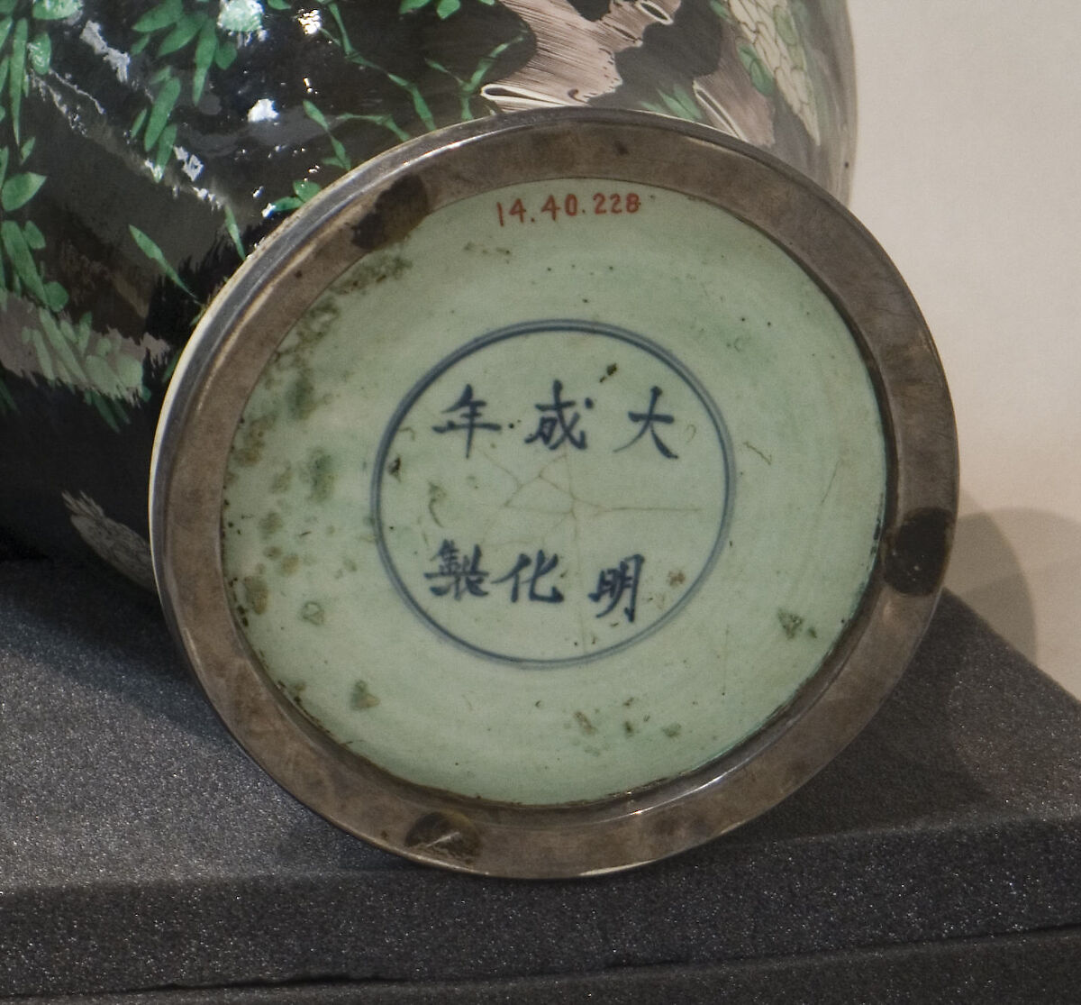 ase with birds and flowers, Porcelain painted in polychrome enamels over black ground (Jingdezhen ware, famille noire), China