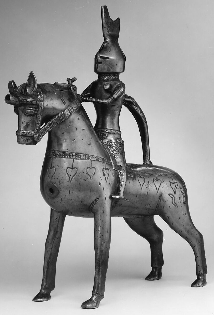 Aquamanile in the Form of a Knight on
Horseback, Bronze; Quaternary copper alloy with a high content of zinc (approx. 73% copper, approx. 15% zinc, approx. 7% lead, approx. 3% tin) with natural patina, hollow cast; remnants of the clay core
and iron armature in the legs, German, Lower Saxony (?)
