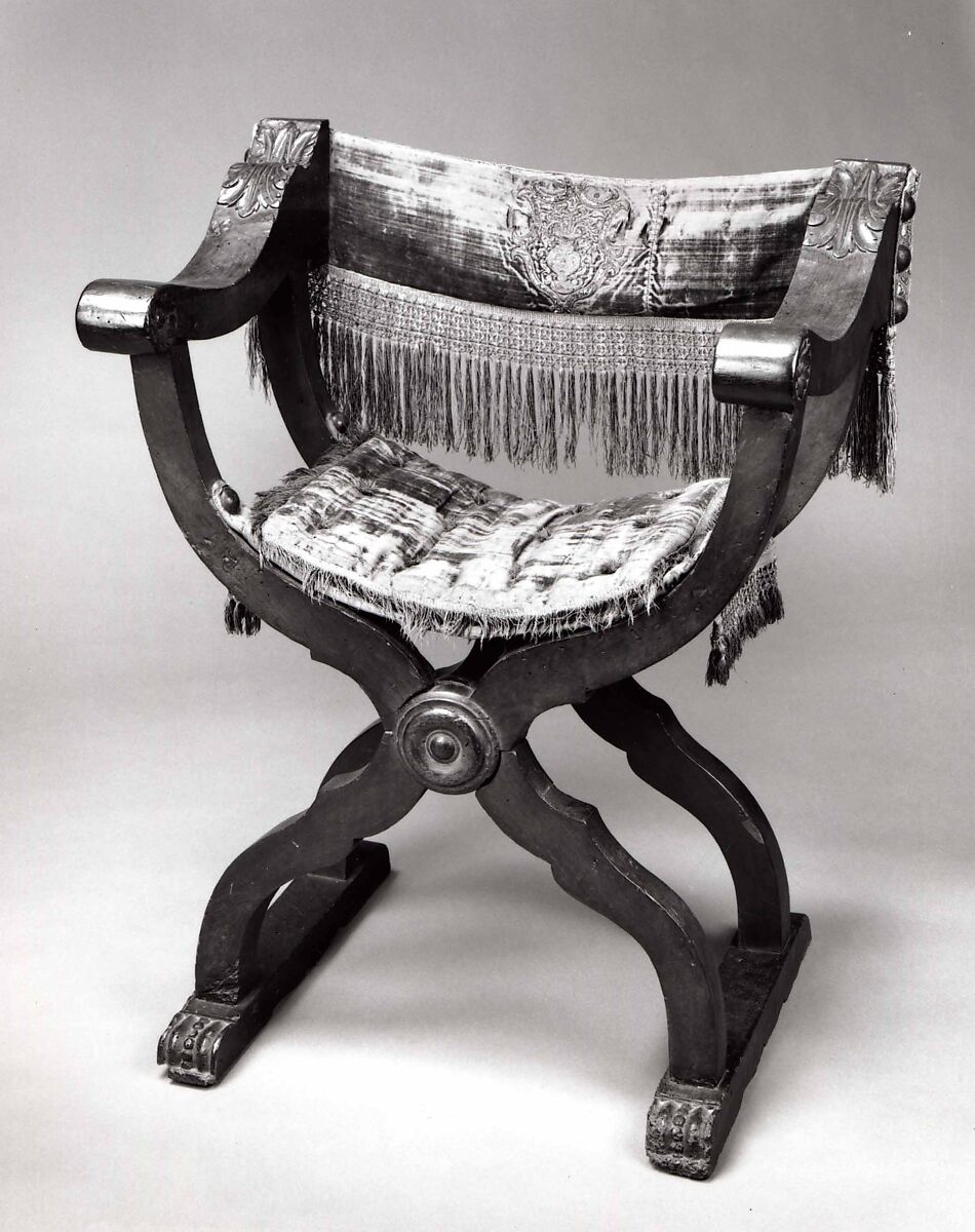 Hip-joint armchair (Dantesca type, associated with 1975.1.1970 a,b), Walnut, carved; embroidery, silk velvet, metal., Italian