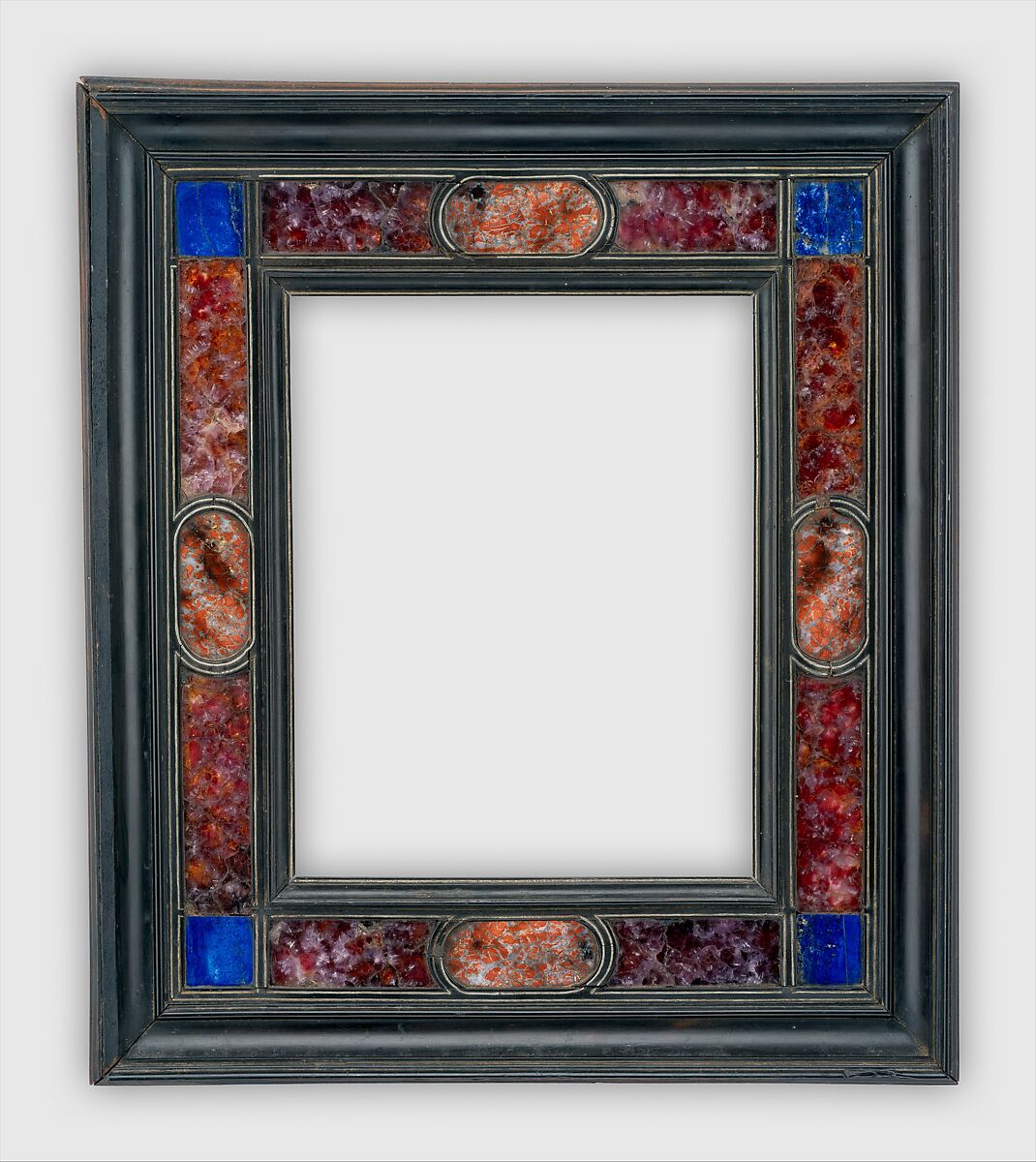 Cassetta frame, Unknown  , working in Rome, Poplar back frame with applied upper moldings in walnut, ebony, and ebonized pearwood.  Half-lapped back frame.  Niello; crystal and lapis lazulipanels with silver leaf beneath; some with dragon's-blood glaze.  Frieze: niello-bordered panels with radius-ended centers and square corners., Italian, Rome