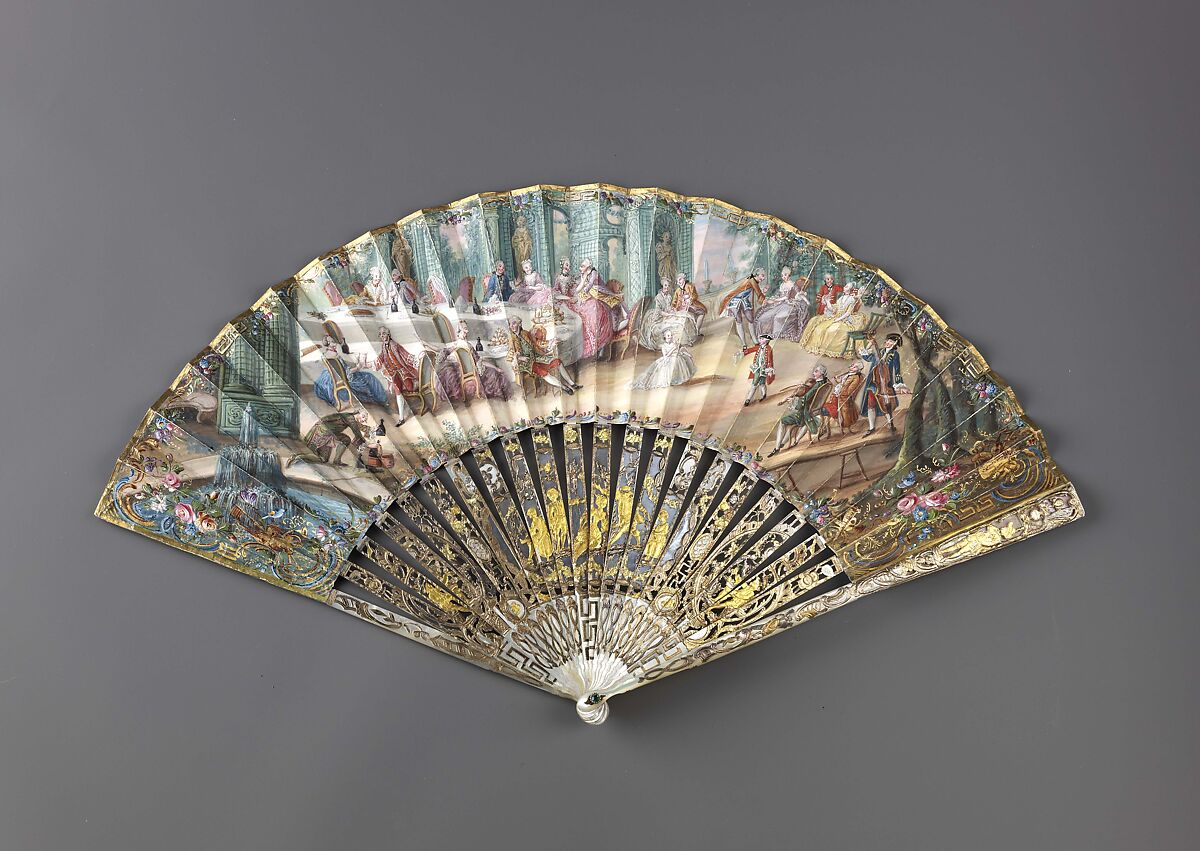Folding fan, Leaf: gouache and bronze paint on paper.
Sticks and guards: mother-of-pearl, carved, pierced and veneered, decorated with gold-and-silver-toned metal leaf.
Pivot: green paste jewel., Austrian or German
