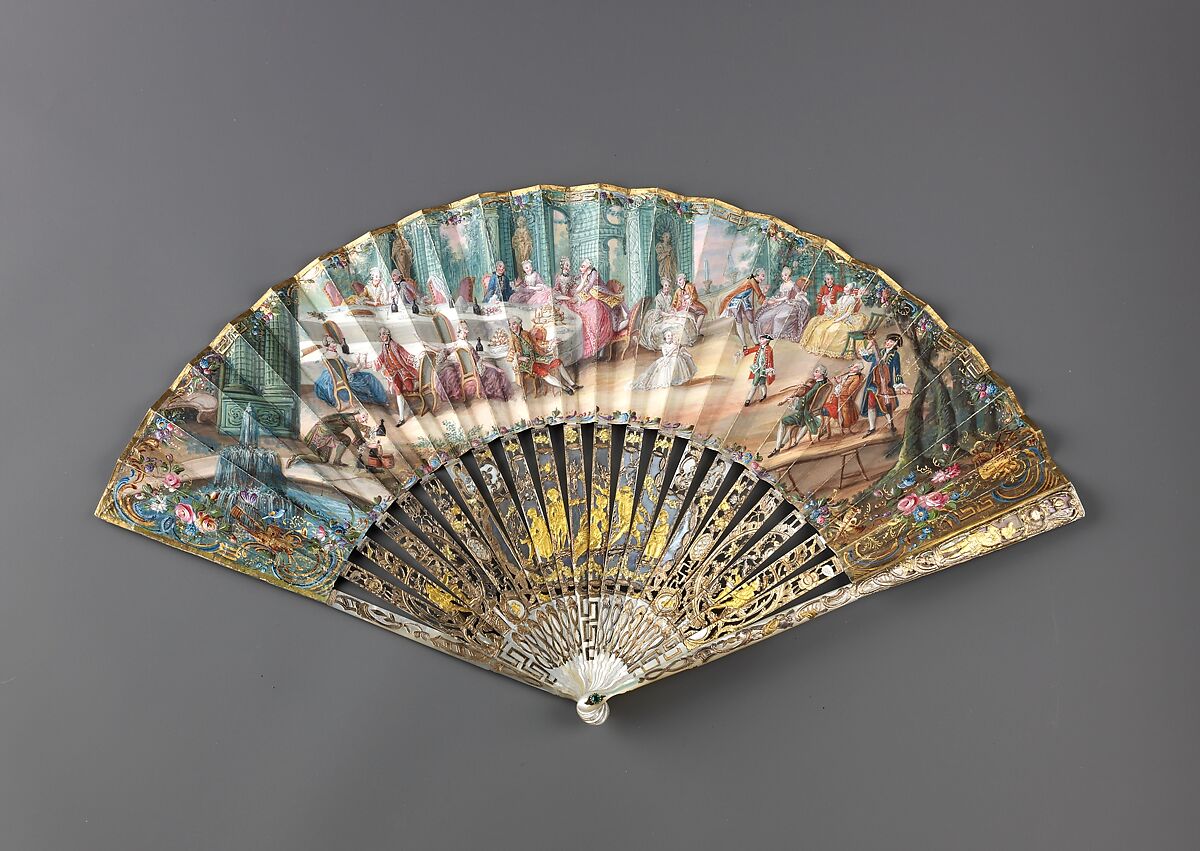 Folding fan, Leaf: gouache and bronze paint on paper.
Sticks and guards: mother-of-pearl, carved, pierced and veneered, decorated with gold-and-silver-toned metal leaf.
Pivot: green paste jewel., Austrian or German 