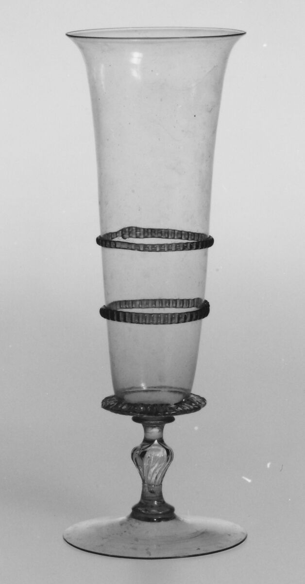 Wineglass, Colorless (slightly gray) and transparent turquoise blue nonlead glass. Blown, pattern molded, trailed, pincered, milled., Façon de Venise, northern European (possibly the Lowlands)