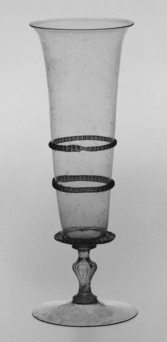 Wineglass, Colorless (slightly gray) and transparent turquoise blue nonlead glass. Blown, pattern molded, trailed, pincered, milled., Façon de Venise, northern European (possibly the Lowlands)