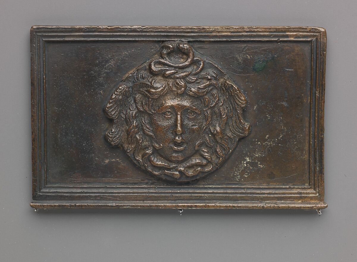 Side panel of a writing box (decorated with Medusa mask), model attributed to Severo Calzetta da Ravenna (Italian, active by 1496, died before 1543), Copper alloy with warm brown patina and areas of a worn black patina on top. 